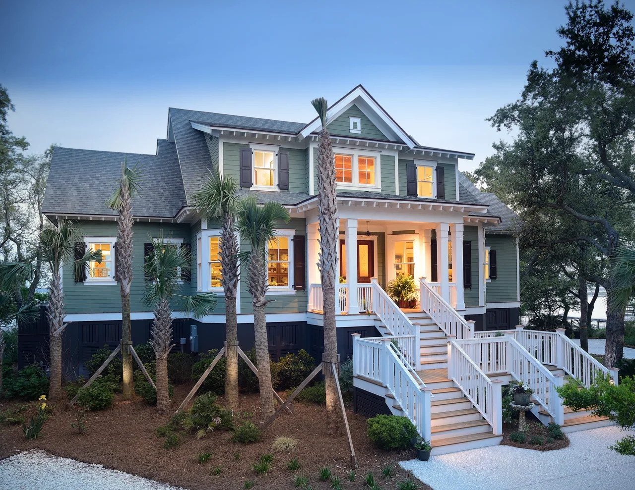 Home exterior illuminated at dusk