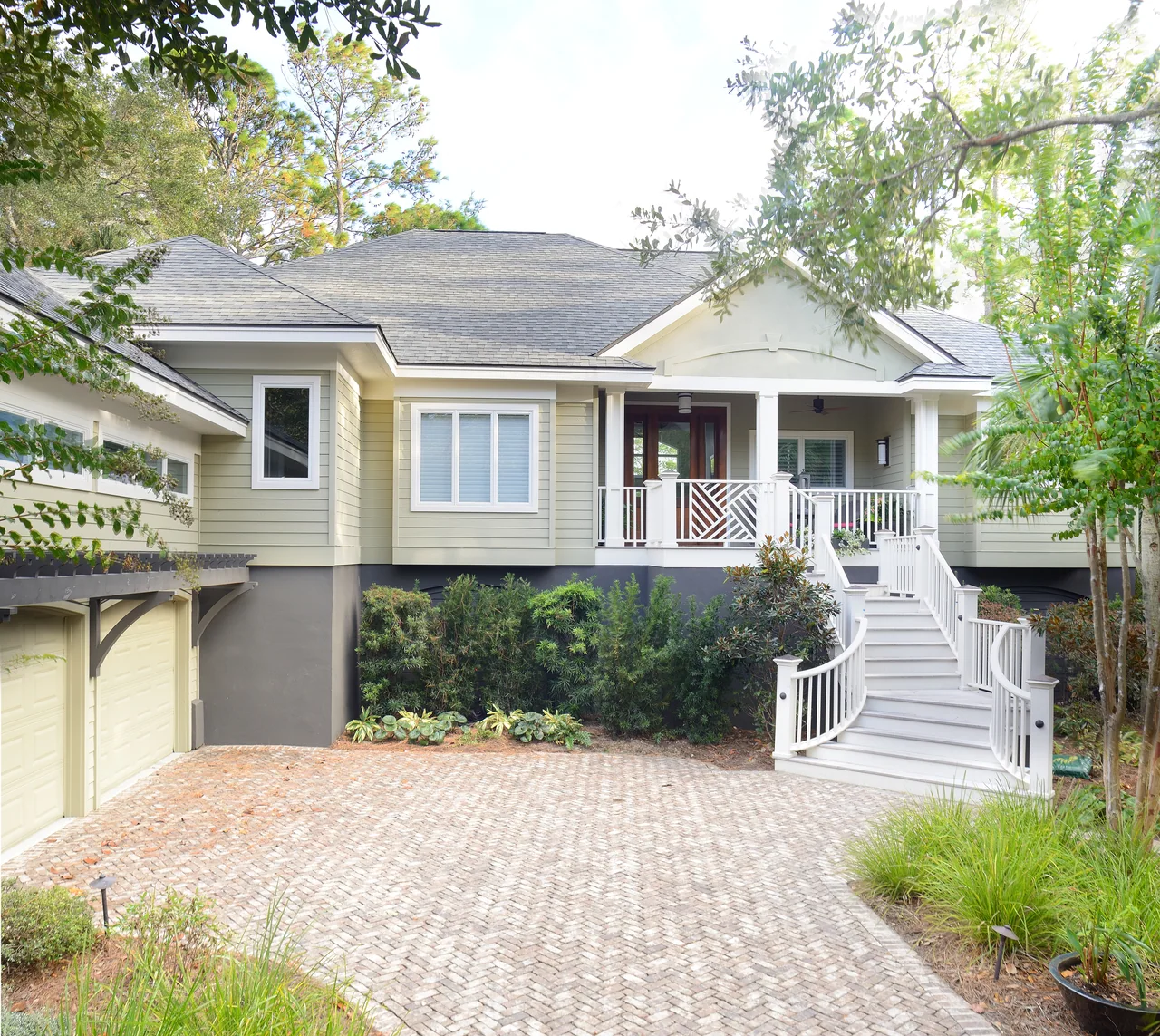 Home exterior surrounded by mature trees